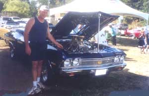 Brian Polishes the chrome on his 68 Chevelle 396